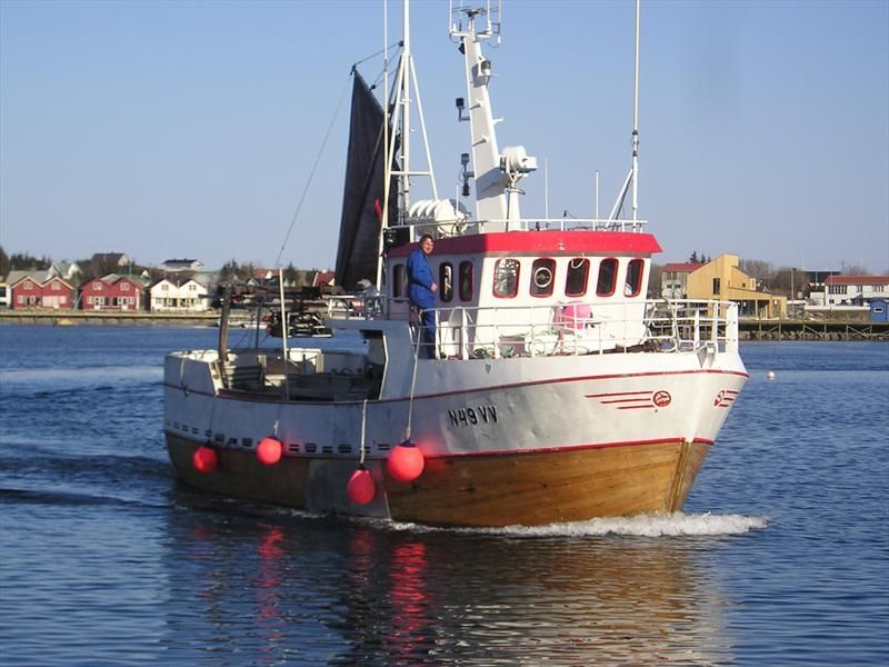 Fishing trawler going out to sea
